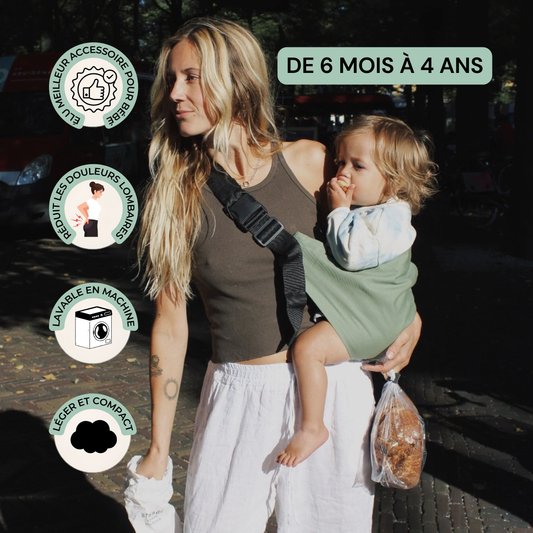 Porte-bébé ergonomique HelloBiboo porté sur le côté avec enfant de 6 mois à 4 ans en extérieur